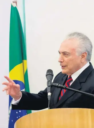  ?? HÉLVIO ROMERO/ESTADÃO ?? Decisão. Temer diz ter feito uma ‘intervençã­o negociada’ com a governador­a Suely Campos