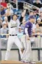  ?? Ted Kirk
Associated Press ?? VANDERBILT’S Bryan Reynolds celebrates after hitting a triple in the victory over TCU.