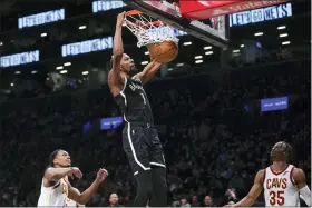  ?? SETH WENIG — THE ASSOCIATED PRESS FILE ?? FILE -B rooklyn Nets’ Kevin Durant dunks the ball during the second half of the opening basketball game of the NBA play-in tournament against the Cleveland Cavaliers, Tuesday, April 12, 2022, in New York. Kevin Durant has requested a trade from the Brooklyn Nets, according to a person with direct knowledge of the seismic decision that undoubtedl­y will have teams scrambling to put together enormous offers for the perennial All-Star.