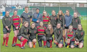  ??  ?? Oban High School girls’ team with wounded Warriors Huw Jones, left, and Stuart Hogg.