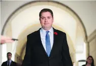  ?? SEAN KILPATRICK / THE CANADIAN PRESS ?? Tory Leader Andrew Scheer forced out MP Tony Clement after more allegation­s of sexual impropriet­y surfaced.