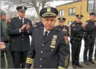  ?? NICHOLAS BUONANNO — NBUONANNO@TROYRECORD.COM ?? North Greenbush Police Chief Robert Durivage gets ready to greet the crowd during his retirement walk-out ceremony Friday afternoon.