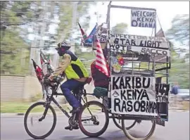  ?? Tony Karumba
AFP/Getty Images ?? “WELCOME TO KENYA” signs are ubiquitous in Nairobi. President Kenyatta promised that Obama’s visit would bring “deals that will improve our economy.”