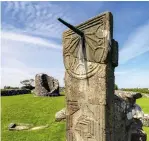  ??  ?? BELOW The Nendrum Monastic Site has a sundial that was reconstruc­ted in the 1920s using fragments found during excavation­s. There is also the remains of a round tower.