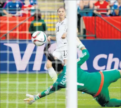  ?? Todd Korol Getty I mages ?? AFTER A FRUSTRATIN­G FIRST HALF, the U. S. f inally scored in the 53rd minute when Alex Morgan beat third- string keeper Stefany Castano. Earlier, an apparent goal was erased by an offside penalty, and Abby Wambach missed a penalty kick.