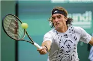  ?? FRISO GENTSCH / DPA ?? No. 4 Stefanos Tsitsipas, whose Wimbledon career includes three first-round losses and one in the fourth round, believes he can make it to the final days.