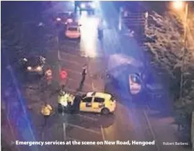  ?? Robert Barbero ?? &gt; Emergency services at the scene on New Road, Hengoed