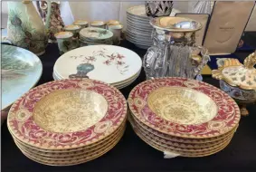  ?? TRACEE HERBAUGH ?? This Sept. 7, 2019photo provided by Tracee Herbaugh shows some of the china for sale at a flea market in Brimfield, Mass. China has become a staple at flea markets, as younger people opt to sell or donate heirloom dishware.