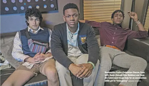  ?? AMAZON STUDIOS ?? Roommates Carlos (Sebastian Chacon, from left), Kunle (Donald Elise Watkins) and Sean (RJ Cyler) need to get help for an unconsciou­s white girl in “Emergency.”