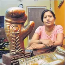  ?? SAMIR JANA/HT PHOTO ?? Women’s boxing coach and referee Razia Shabnam at her residence in Kolkata.