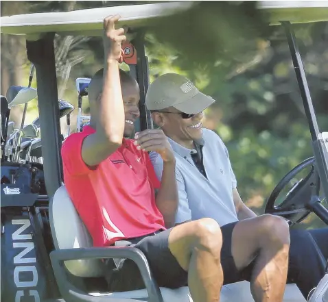  ?? AP PHOTO ?? Former Celtic star Ray Allen and President Obama yuk it up at the Farm Neck Golf Club in Oak Bluffs yesterday.