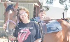  ??  ?? Current crop: Shepparton Riding for the Disabled Associatio­n’s treasurer Keren Fletcher (front) and secretary Cathy Hamilton with Nikita.