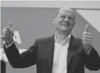  ?? MICHAEL KAPPELER/DPA VIA AP ?? Olaf Scholz, leader of Germany’s Social Democratic party, gives a thumbs-up after his party approved a planned coalition agreement Saturday in Berlin.