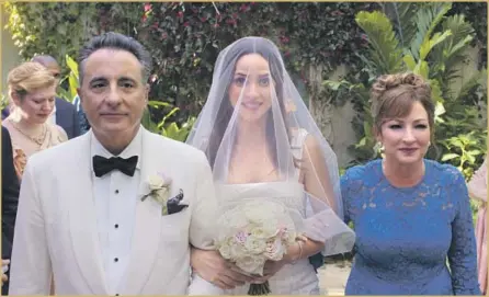  ?? Warner Bros. ?? ANDY GARCIA, from left, Adria Arjona and Gloria Estefan in HBO Max’s remake of “Father of the Bride” centered on Latino families.