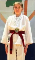  ??  ?? National Kata champion, Gemma Kelledy with her gold medal at the Annual Karate Ireland Open National Championsh­ips.