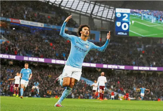  ?? — Reuters ?? City on fire: Manchester City’s Leroy Sane celebratin­g after scoring the third goal against Burnley at the Etihad on Saturday.