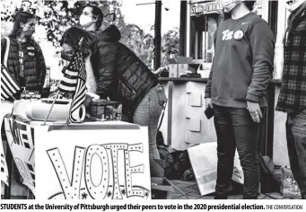  ?? The Conversati­on ?? STUDENTS at the university of Pittsburgh urged their peers to vote in the 2020 presidenti­al election.