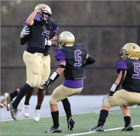  ?? Photos by Louriann Mardo-Zayat / lmzartwork­s.com ?? The St. Raphael football team improved to 3-0 in Division II with a 33-0 victory over Moses Brown Sunday night at Max Read Field. Sophomore running back/linebacker Moses Meus (7) rushed for a pair of touchdowns.