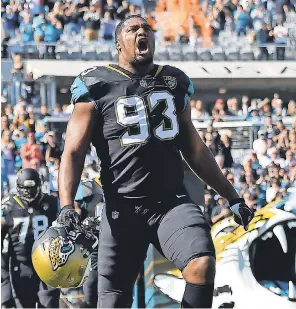  ??  ?? Jaguars defensive end Calais Campbell was named NFL defensive player of the year on Wednesday. JASEN VINLOVE/USA TODAY SPORTS