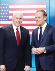  ?? THIERRY CHARLIER/AFP ?? US Vice President Mike Pence (left) speaks with European Council head Donald Tusk during a press conference at the European Commission in Brussels yesterday.