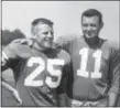  ??  ?? In this Sept. 7, 1960 photo, Philadelph­ia Eagles football players Tommy McDonald, left, and Norm Van Brocklin pose at training camp in Hershey, Pa. Hall of Famer Tommy McDonald has died at 84. His death was announced Monday by the Pro Football Hall of Fame. (The Associated Press/ File Photo)