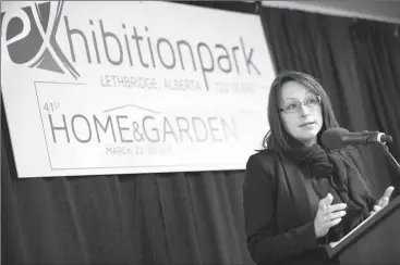  ?? Herald photo by Ian Martens ?? Angela Zuba, CEO of the Canadian Home Builders Associatio­n Lethbridge Region, speaks about some of the new features of this year’s Home and Garden Show set for later this month at Exhibition Park. @IMartensHe­rald