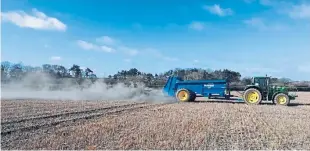  ??  ?? A field trial of applying rock dust in a bid to combat climate change.