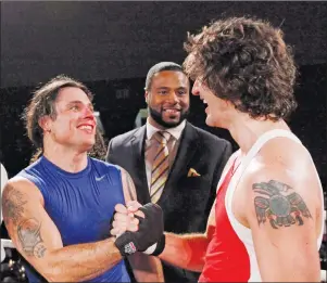  ?? CP PHOTO ?? Conservati­ve Senator Patrick Brazeau congratula­tes Liberal MP Justin Trudeau after their charity boxing match for cancer research Saturday, March 31, 2012 in Ottawa. Justin Trudeau says he “regrets” comments he made about Sen. Patrick Brazeau in a...