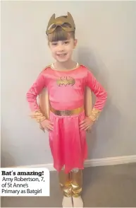  ??  ?? Bat’s amazing! Amy Robertson, 7, of St Anne’s Primary as Batgirl