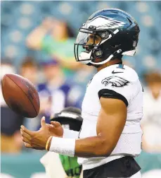  ?? RICH SCHULTZ/AP ?? Philadelph­ia Eagles’ Jalen Hurts, above, WR DeVonta Smith, a healthy offensive line, and a defensive line full of age, youth and talent are viewed as the tickets out of the NFC East basement.