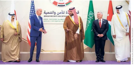  ?? ?? BIDEN AND SAUDI CROWN PRINCE Mohammed bin Salman flanked by Bahrain’s King Hamad bin Isa bin Salman al-khalifa (left) and Jordan’s King Abdullah II and Qatar’s Emir Sheikh Tamim bin Hamad al-thani during a photo opportunit­y at the Jeddah Security and Developmen­t Summit, in Saudi Arabia’s Red Sea coastal city of Jeddah on July 16.