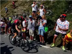  ?? (AP) ?? Geraint Thomas climbs the Tourmalet pass during the 14th stage of the Tour de France