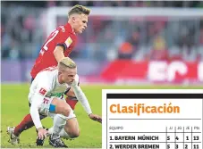  ??  ?? CLÁSICO. Bayern Múnich y Augsburgo empataron ayer en el clásico de Baviera.