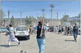  ?? REUTERS ?? A member of the Taliban outside the Kabul airport.