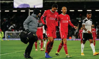  ??  ?? Joël Matip was forced off with a back spasm during Liverpool’s draw at Fulham. Photograph: Javier García/BPI/REX/Shuttersto­ck