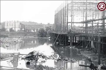  ??  ?? Floods at the Stour Centre site - which opened in February 1975 - close to the River Stour which has burst its banks; the one-time Energen factory can be seen across the river