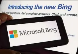  ?? Richard Drew / Associated Press ?? Microsoft made major fixes to its Bing chatbot search engine and is bringing the new AI technology to its Bing smartphone app, as well as the app for its Edge internet browser.