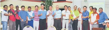  ??  ?? Yii (ninth right) and Pui (eighth right) with golfers at the inaugural Miri Golf Club (KGM) Inter-community Golf Challenge on Saturday.