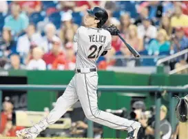  ?? MITCHELL LAYTON/GETTY IMAGES ?? The Marlins see OF Christian Yelich, above, as a perfect fit for their No. 3 spot, where his ability to hit for average can get him on base and give Giancarlo Stanton RBI chances.