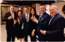  ??  ?? Il Presidente di Care Holding SpA Claudio Boso e il Business Manager Pierluigi Leoni si compliment­ano con i nuovi Business Manager: Pascal Di Cesare, Alessandra Laiolo, Giulia Rovetto, Gianni Sabatini