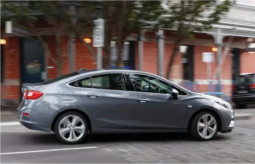  ??  ?? SEDAN LIFE: The Holden Astra Sedan joins its hatchback sibling in the range, but the four-door is built in Korea while the five-door hails from Europe. Aimed at an older market than the hatch, suspension is softer and it is cheaper too: it starts from...