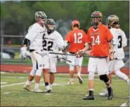  ?? AUSTIN HERTZOG - DIGITAL FIRST MEDIA ?? Spring-Ford’s Ryan Rosenblum (9) and Tate Pijanowski (22) celebrate a goal during Thursday’s game against Perkiomen Valley.