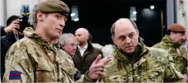  ?? Reuters ?? ↑
Ben Wallace meets with British troops in Tapa Army Base, Estonia, on Thursday.