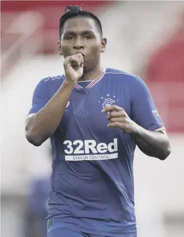  ??  ?? 0 Alfredo Morelos celebrates his second and Rangers’ fifth goal against Red Imps in Gibraltar.