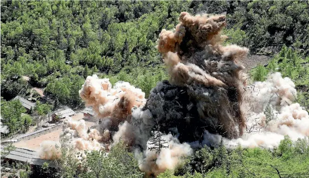  ?? AP ?? A tunnel at North Korea’s nuclear test site is blown up in Punggye-ri, North Korea. North Korean leader Kim Jong Un made good on his promise to demolish his country’s nuclear test site.