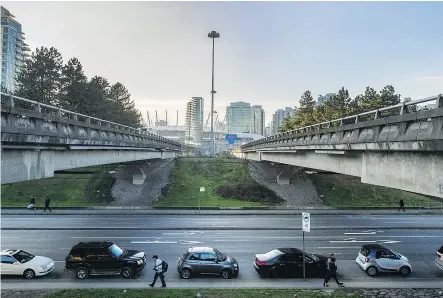  ?? —ARLEN REDEKOP ?? Life around the Georgia and Dunsmuir viaducts is set to change after the city voted on a 20-year redevelopm­ent plan for the area that will see the viaducts come down.