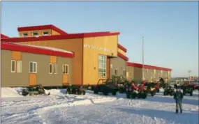  ?? MARK THIESSEN — THE ASSOCIATED PRESS ?? This photo shows the exterior of Anthony A. Andrews School in Saint Michael, Alaska, a remote island community off the state’s western coast in the Bering Strait. The Alaska National Guard visited the Bering Strait community as part of its annual...