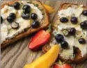  ??  ?? Blueberry and Goat Cheese Toast with Lemon Thyme Butter.