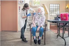  ?? NYT ?? An elderly woman receives a booster shot of Covid-19 vaccine at Fircrest Senior Living in Oregon on Oct 6.