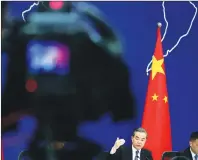  ?? AP PHOTO ?? Chinese State Councilor and Foreign Minister Wang Yi, gestures as he speaks during a news conference at the Ministry of Foreign Affairs in Beijing, Tuesday.